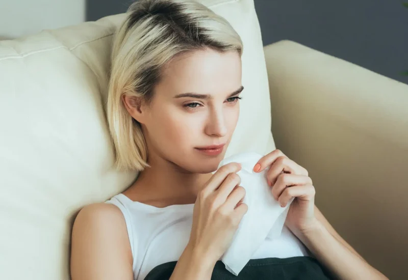 Woman sick in bed. Female portrait ill in bedroom